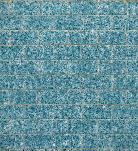 Typical architecture of Fuseta buildings with cute design azulejos and intricate details, Algarve, Portugal.